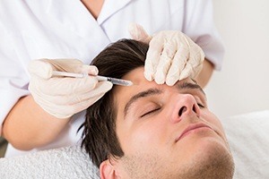 Man receiving Botox injection