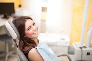 Smiling woman in dental chair