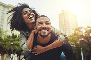  Couple smiling while walking outside