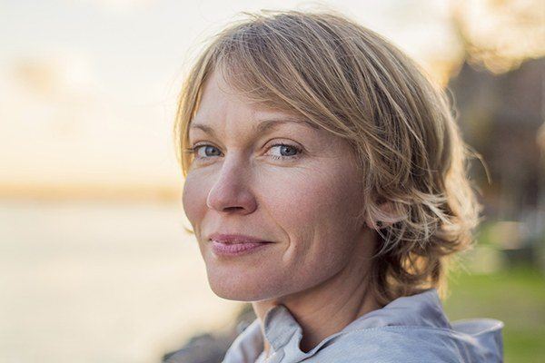 woman smiling outside