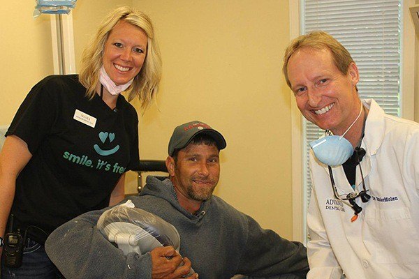 Dentist with patient