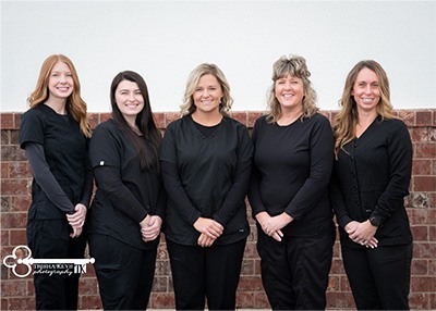 Smiling dental team members in Springfield