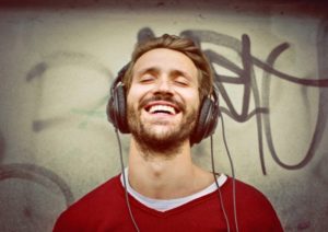 man with porcelain veneers laughing