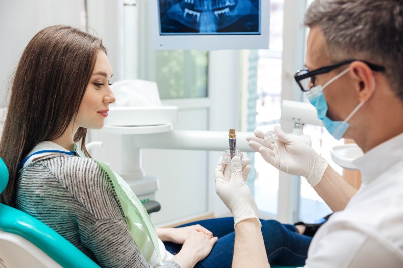 woman at dental implant consultation in Springfield