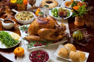 Thanksgiving meal on a table with fall decorations